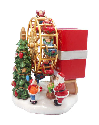 Spieluhr mit Weihnachtsmann, Riesenrad, Tannenbaum und großem Geschenk, ca. 14 cm, von LATÉLIO